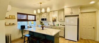 A charming cottage, recently renovated in a serene wooded area of Hanceville, AL