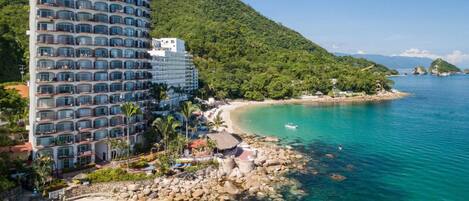 On the beach, sun-loungers, beach towels