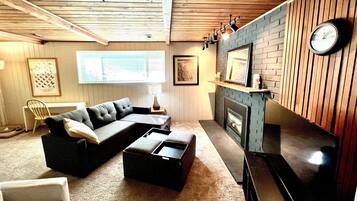 Smart TV, fireplace, table tennis, books