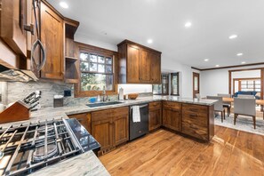 Fridge, microwave, oven, stovetop - Highlands Hideaway  By Tahoe Getaways - 4BR, Pet Friendly w Hot Tub (Tahoe City)