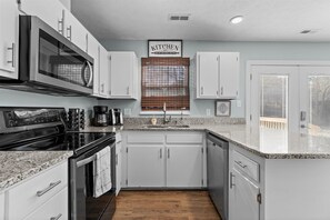 Fridge, microwave, stovetop, dishwasher - Newly updated home 2.6 miles to downtown raleigh (Raleigh)