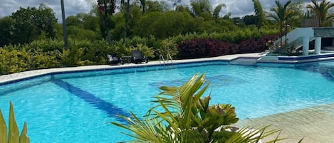 Outdoor pool, open 8:00 AM to 9:00 PM, pool umbrellas, sun loungers