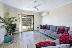 Family Apartment, 2 Bedrooms | Living area | 100-inch Smart TV with digital channels - Gold Rush Apartments (Monkland)