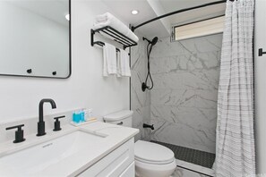 Hair dryer, towels, soap, shampoo