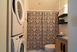 Hair dryer, towels, soap, shampoo