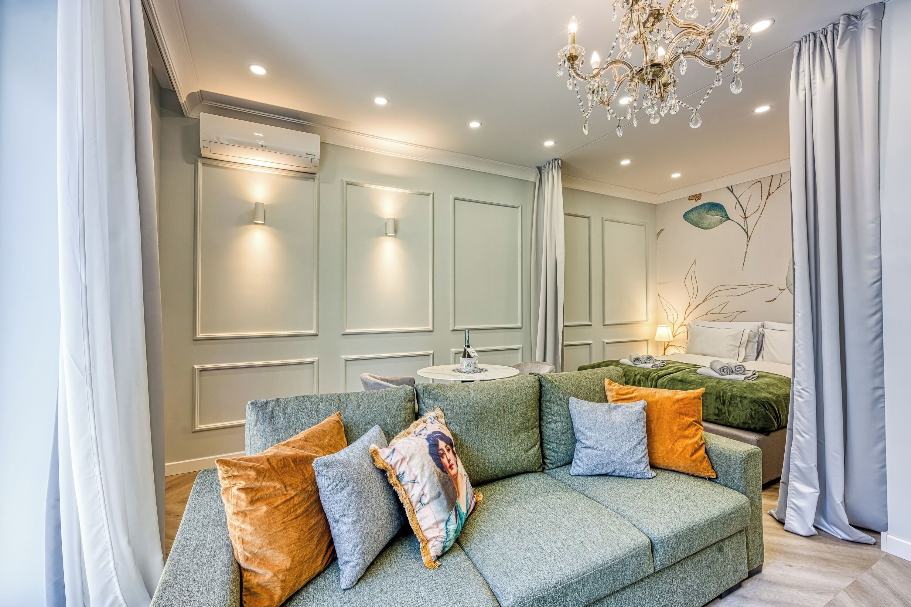 Family Studio (Boutique Downtown Studio with Balcony) | Living area | 21-inch flat-screen TV with digital channels