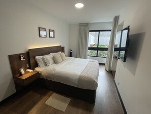 Egyptian cotton sheets, premium bedding, down comforters, in-room safe
