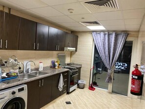 Private kitchen - Fully Furnished 2 BHK Apartment
(Dubai)