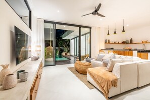 50-inch Smart TV with cable channels, stereo - Villa Ozkar - Elegant 3 Bedroom Villa with Pool & Sunset Terrace (Canggu)