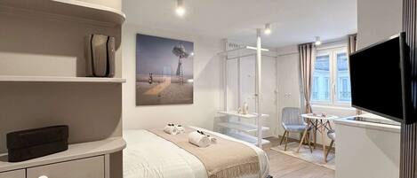 Desk, iron/ironing board, travel crib, WiFi