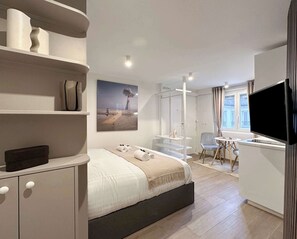 Desk, iron/ironing board, travel crib, WiFi