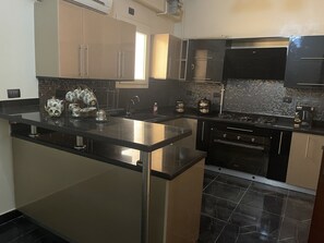 Private kitchen - Cozy Home in the heart of new Cairo (New Cairo City)