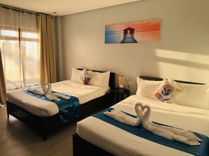 ห้องแฟมิลี่ | โต๊ะทำงาน, เตารีด/โต๊ะรีดผ้า, Wi-Fi ฟรี, ผ้าปูที่นอน