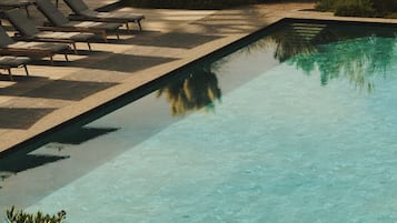 Indoor pool, outdoor pool, open 7:00 AM to 9:00 PM, pool umbrellas