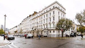 A large, historic building with multiple floors and a classic architectural style.