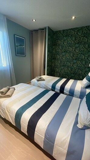 3 habitaciones, tabla de planchar con plancha y wifi gratis