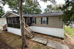 Exterior - 🌴 The Beach House at Ocean Lakes | 1,600 Sq Ft • Sleeps 8–10 • MH125 • Porch • Trailer Parking (Myrtle Beach)