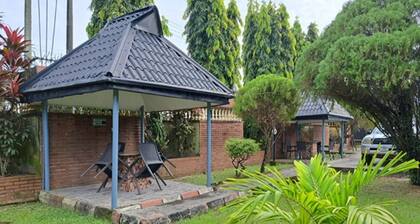 Cozy, serene, inviting, and homely environment. Near enough, and affordable too!