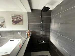 Shower, free toiletries, hair dryer, slippers