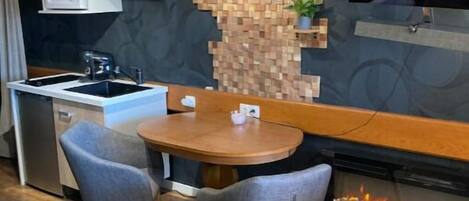 Fridge, microwave, stovetop, coffee/tea maker