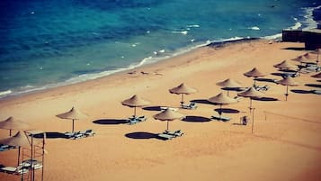 Private beach, sun-loungers, beach umbrellas, beach towels