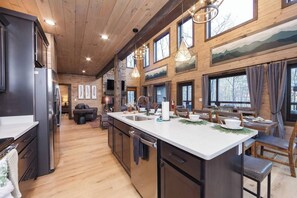 Fridge, microwave, oven, stovetop - Luxury Smoky Cabin: Indoor Pool, Hot Tub & Theater (Sevierville)