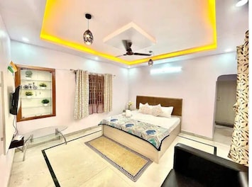 Spacious bedroom with Kingsize bed, Sofa, Smart TV, Wifi with Disney Hotstar etc