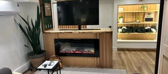 Southern New England Luxury with private patio, fireplace, spa like bathroom!