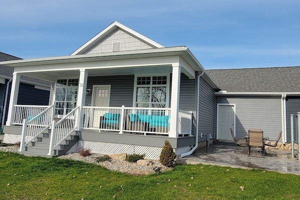 Spacious deck and patio for ample seating choices.