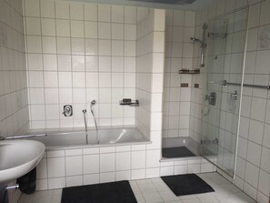 Shower, hair dryer, towels, soap
