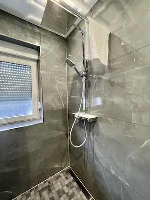Shower, free toiletries, hair dryer, towels