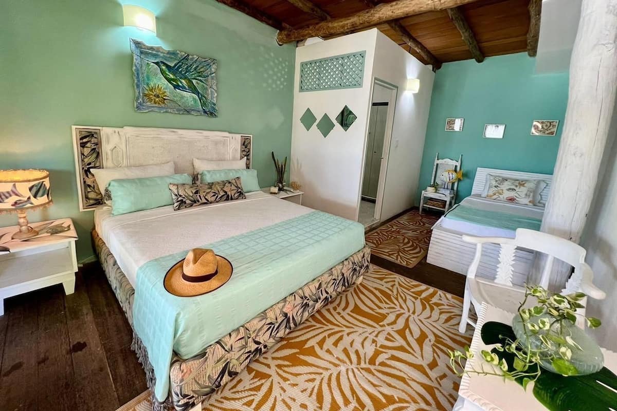 Deluxe Quadruple Room | Laptop workspace