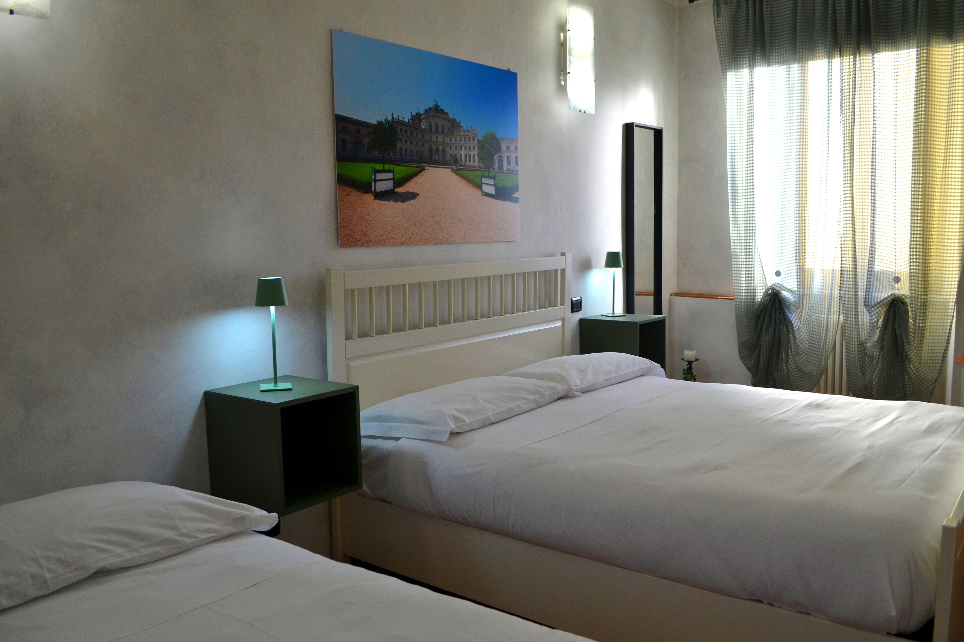 Superior Triple Room | Desk, blackout drapes, iron/ironing board, free WiFi