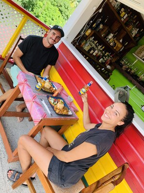 Outdoor dining -  Enjoy Dominica's tranquility, and local cuisine at Le Petit Paradis! (Roseau Valley)