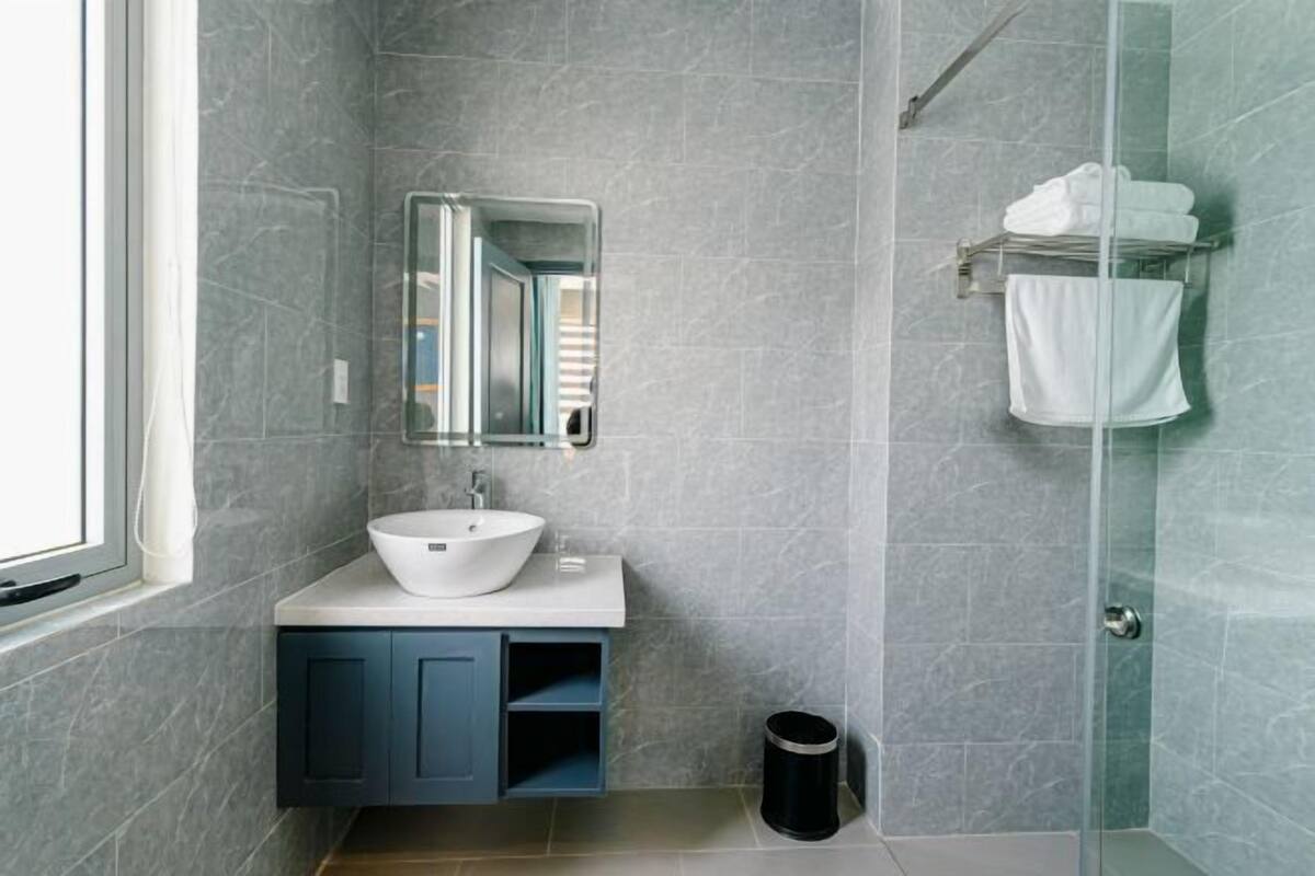 Bathroom | Shower, rainfall showerhead, eco-friendly toiletries, hair dryer