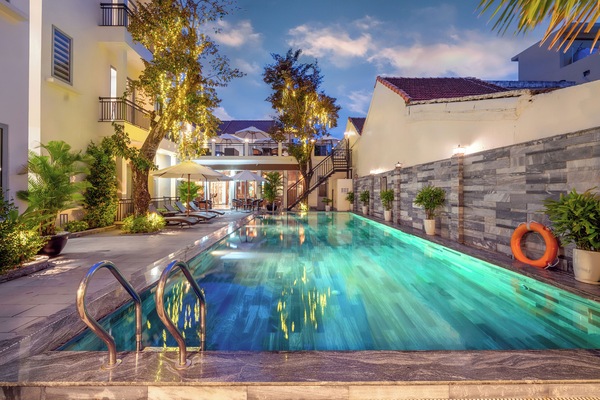 Apartment, 2 Bedrooms, Pool View | Hypo-allergenic bedding, memory foam beds, minibar, desk
