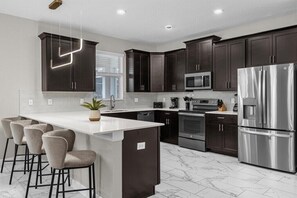 Fridge, microwave, oven, stovetop - 7 Bedrooms/ 6 Bathrooms/ Champions Gate (9033 ST) (Davenport)