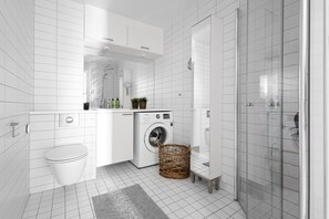 Shower, hair dryer, towels, soap