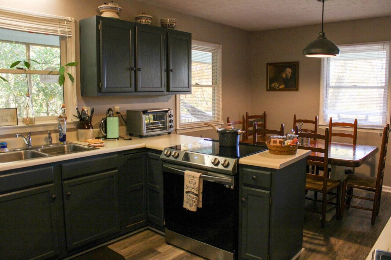 Fridge, microwave, coffee/tea maker, cookware/dishes/utensils