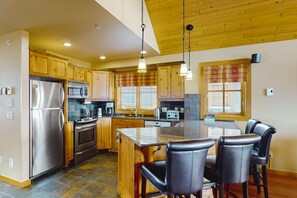 Fridge, microwave, oven, stovetop - Woodcutter Cabin 16 | Snowy ski-in/out getaway with private hot tub & fireplaces (Big White Mountain)