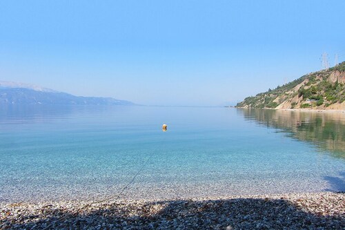 Ianos Maisonette - 1880s Seafront Stone House with King Beds by Hilton