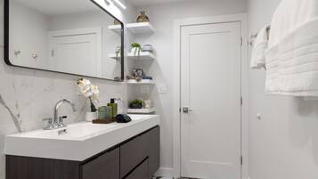 Shower, hair dryer, towels, soap