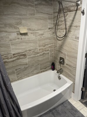Hair dryer, towels, soap, shampoo