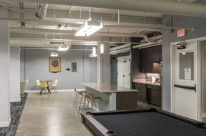 Games room - Modern Industrial Apartment with Skywalk (Des Moines)