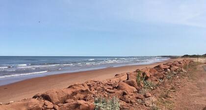 Beach House across from Savage Harbour Beach with Spectacular Ocean View!