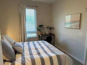 2 bedrooms, desk, iron/ironing board, travel crib