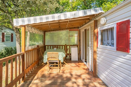 Mobile Home 'Mh 227 Les 3 Coups Aux Mathes' avec terrasse privée, jardin privé et climatisation