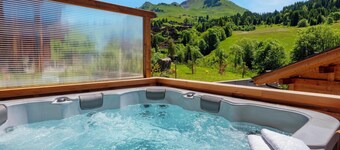 Chalet Trusquin - séjour alpin 14p avec jacuzzi - OVO Network