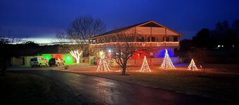 Located on a 12 acre orchard, this large upscale home features stunning views