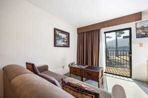 TV, fireplace - Cozy Studio w/ Partial Lake view #223 at Donner Lake Village (Truckee)